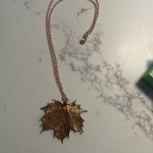 Maple leaf copper electroplated necklace.